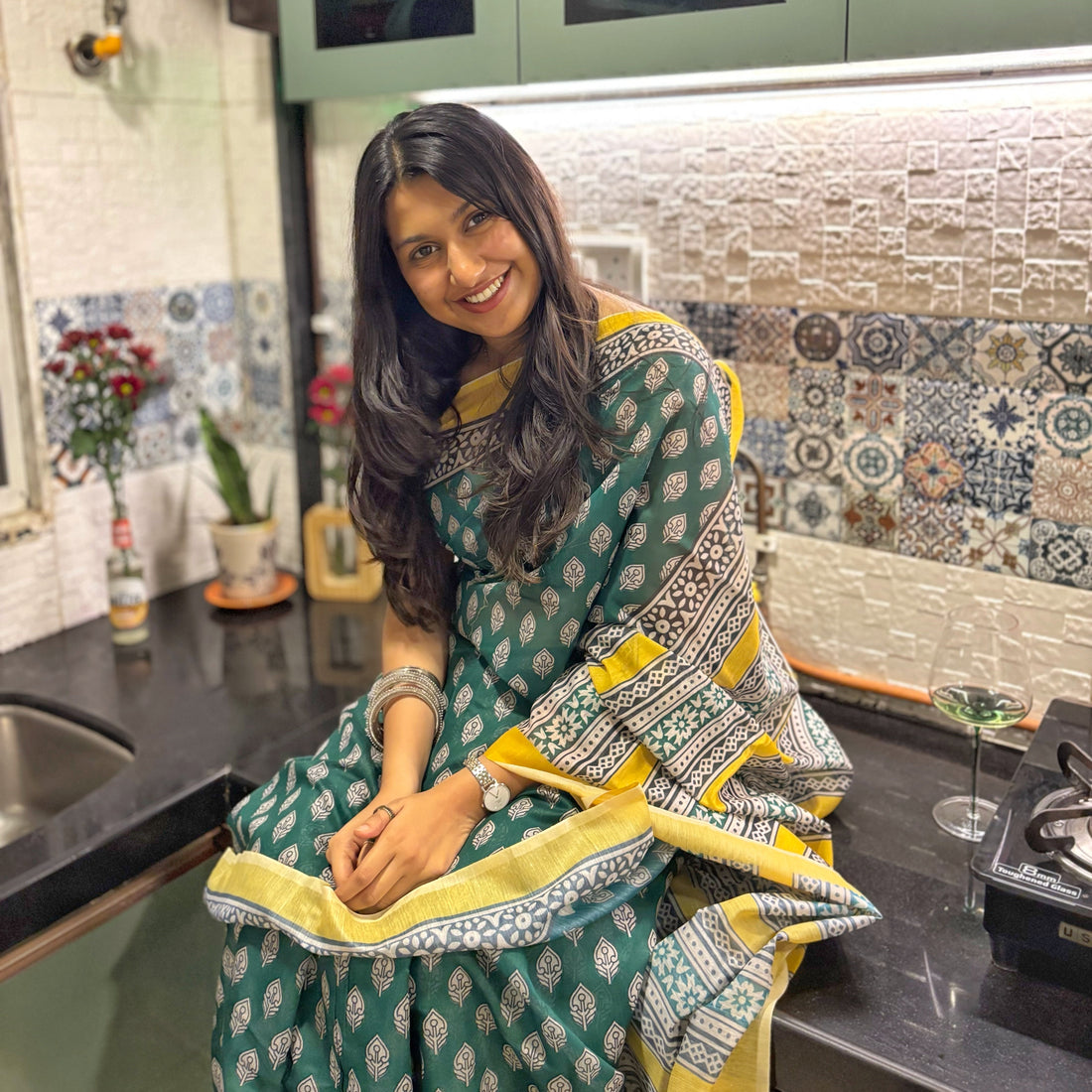 Woman wearing a breathable cotton saree in natural light
