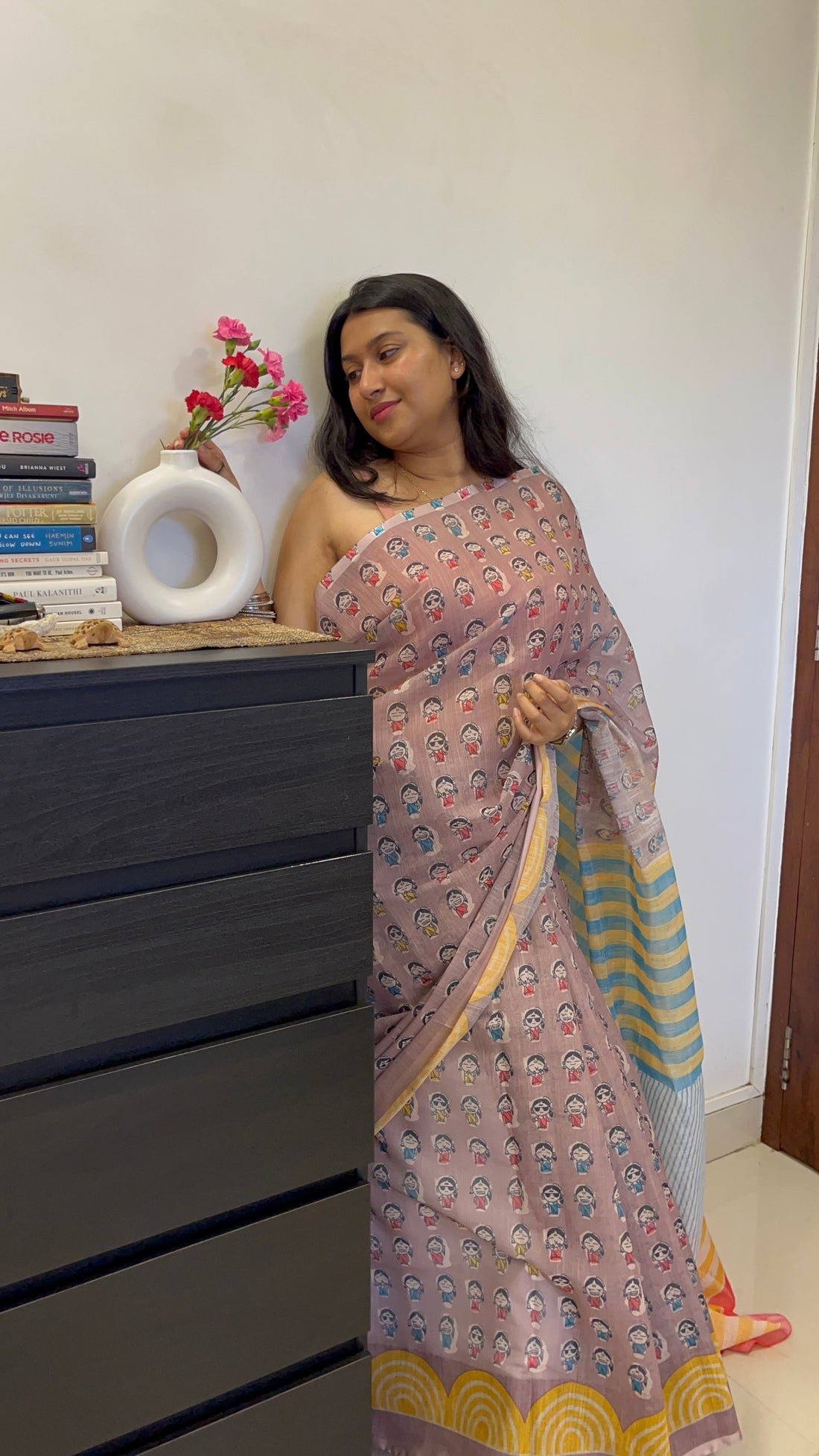 Linen saree drape for pregnancy with a relaxed waist and neat pleats