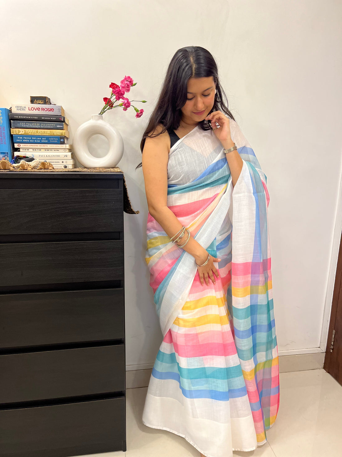 Minimal linen saree with clean drape and modern styling