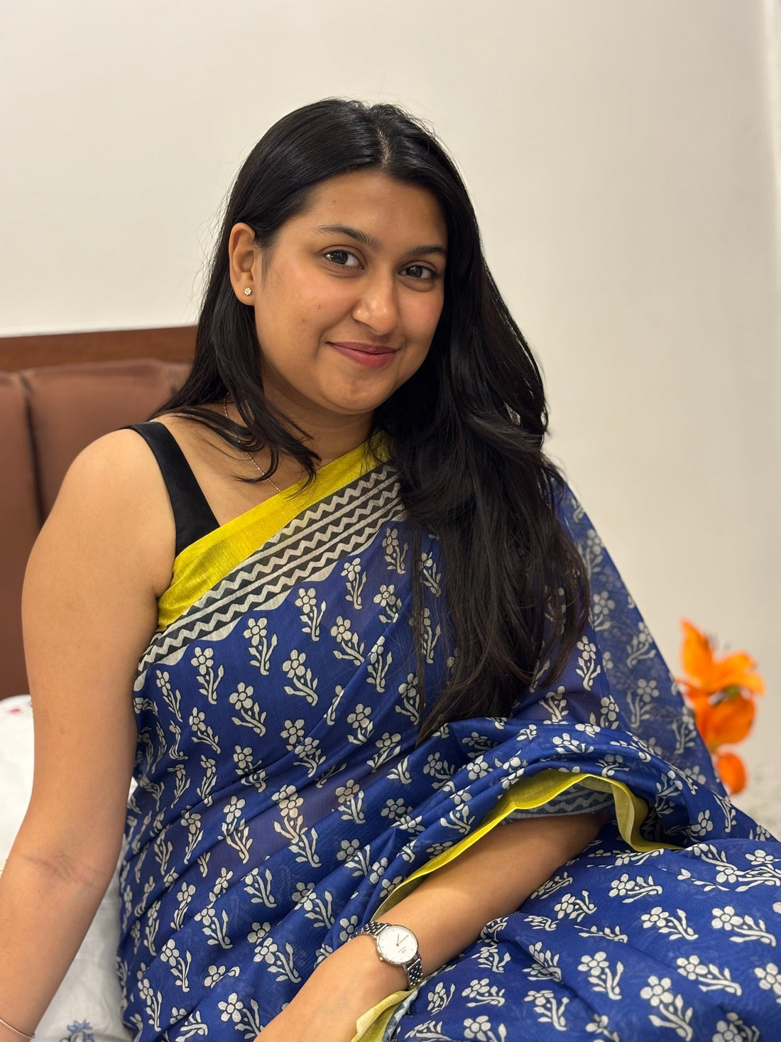 Woman walking confidently in a saree with proper drape