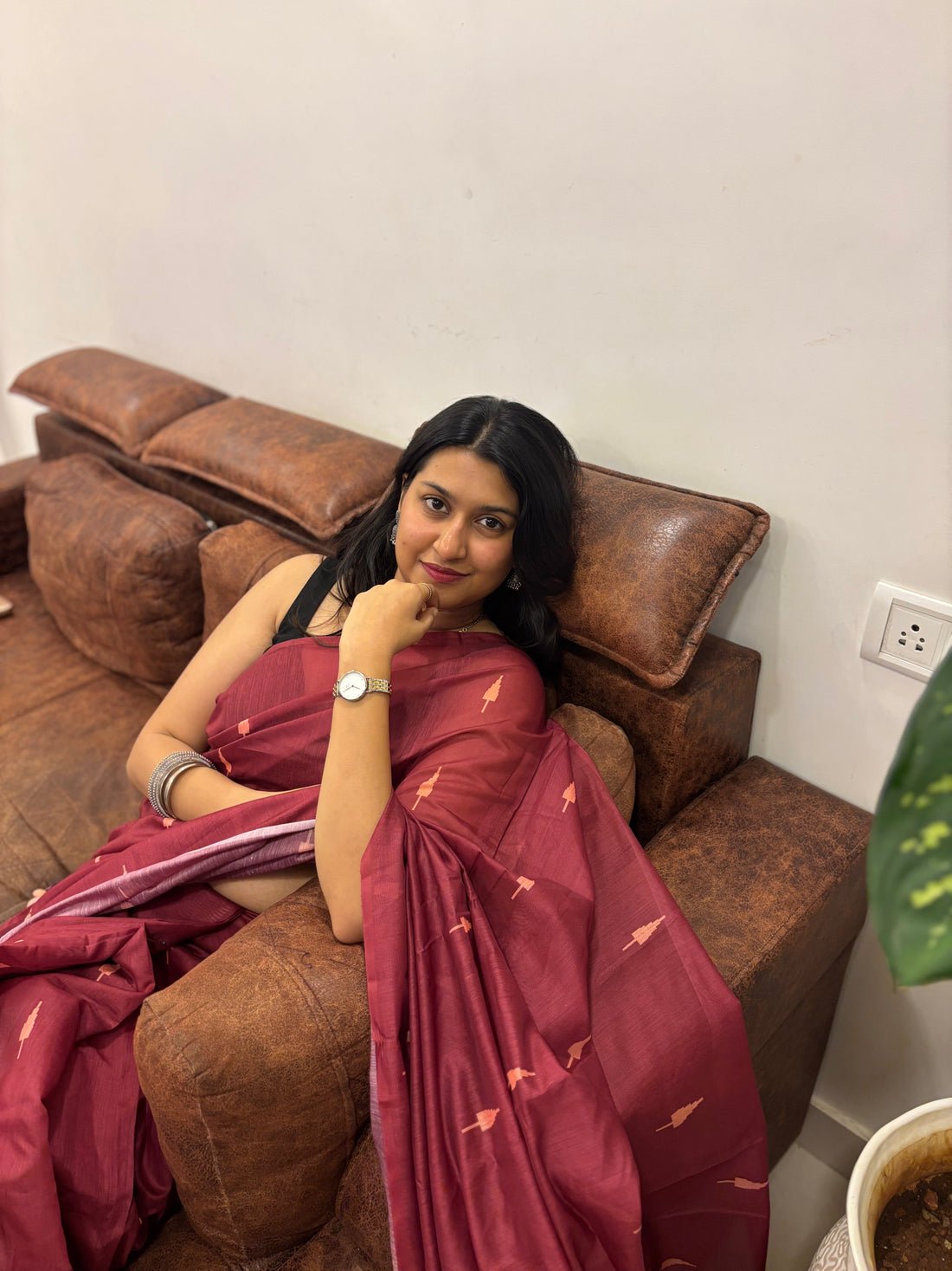 Woman styled in saree to look taller