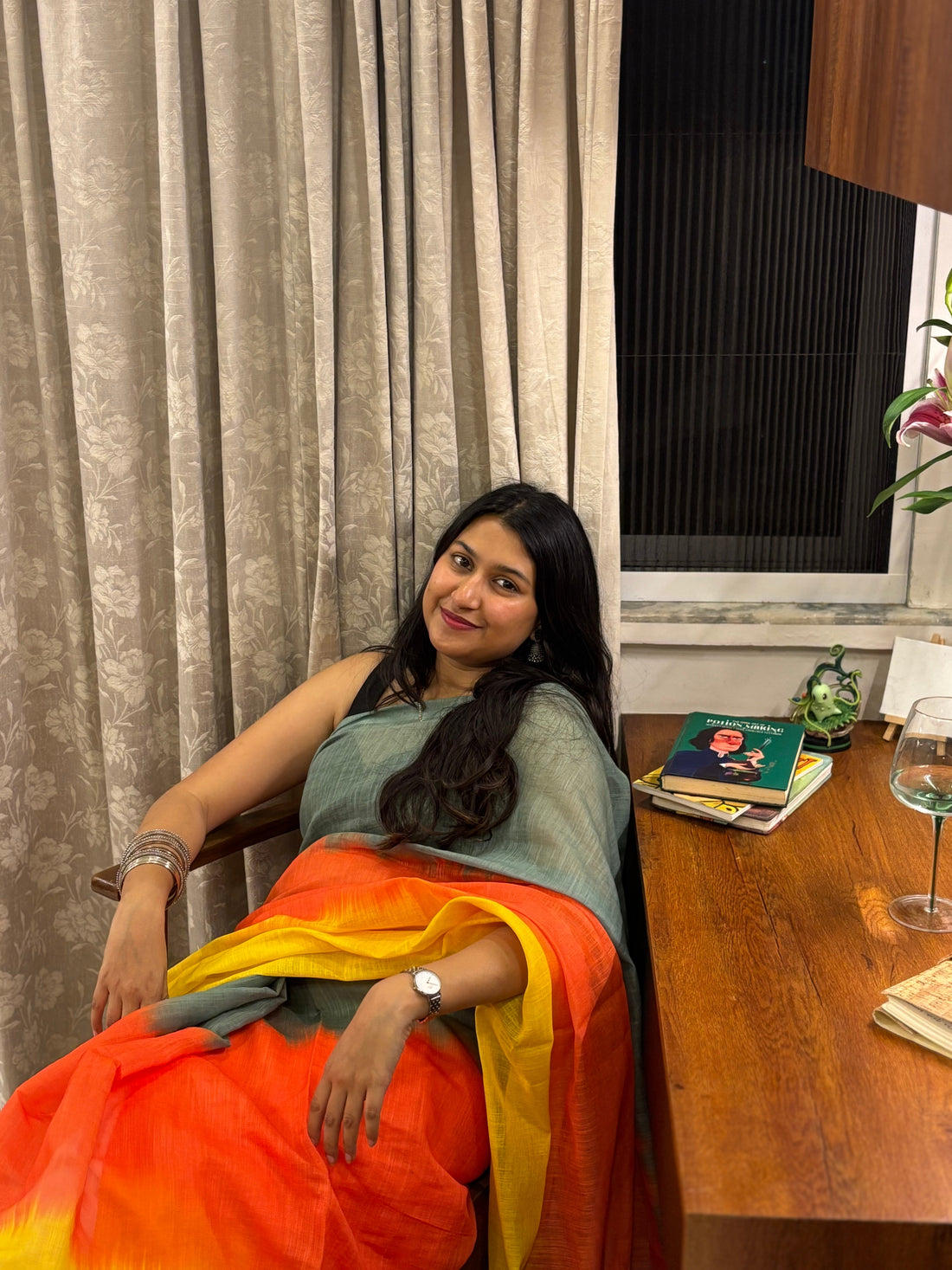 Women of different ages wearing linen sarees in modern styles