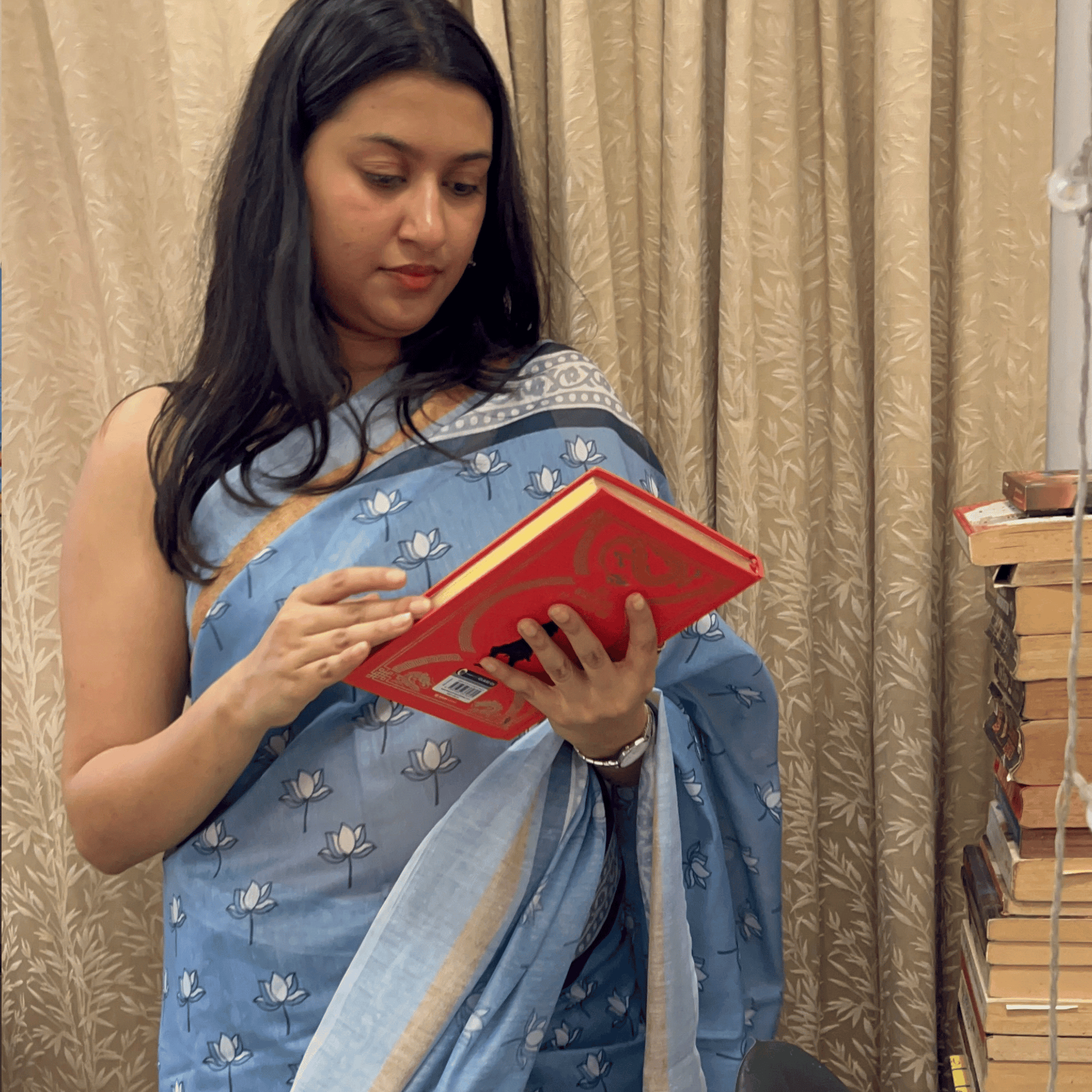 Women in blue cotton saree. Lotus cotton saree. cotton sari blue in colour.